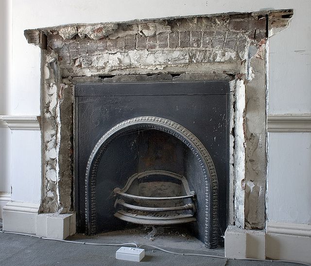 Reinstated fireplace with exposed brickwork